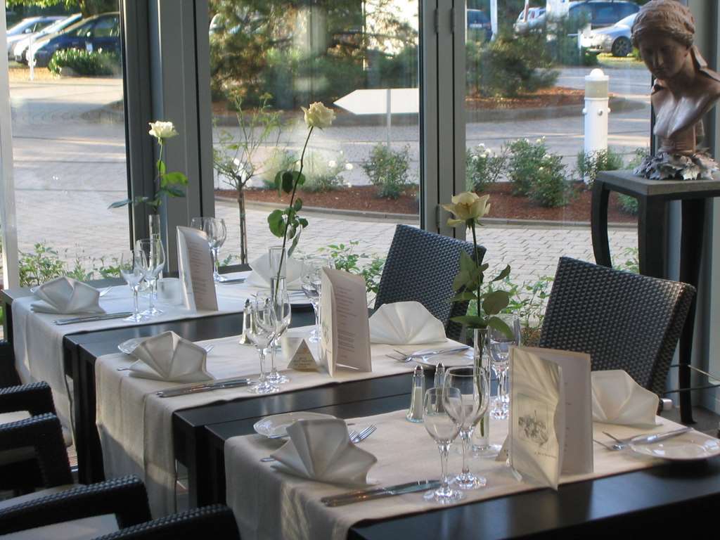 Ringhotel Am Stadtpark Lünen Ресторант снимка